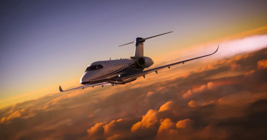 private-jet-flying-above-clouds