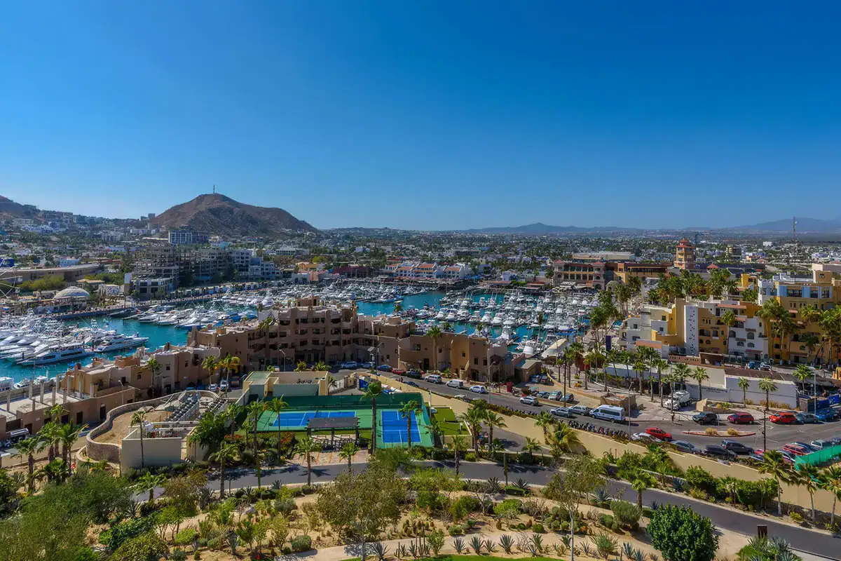 View over the Cabo San Lucas marina and surrounding town, illustrating property tax in Los Cabos
